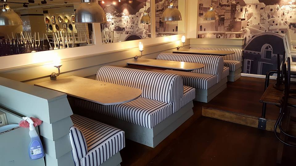 Restaurant seats upholstered with stripes fabric